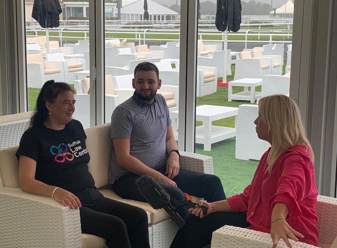 Julie Baker, Discrimination Caseworker at Suffolk Law Centre (left) and Luke Jackson (centre), interviewed by BBC Look East at the launch of the Autism Education Leavers Passport on 6th August.